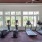 Fitness center featuring cardio and free weights